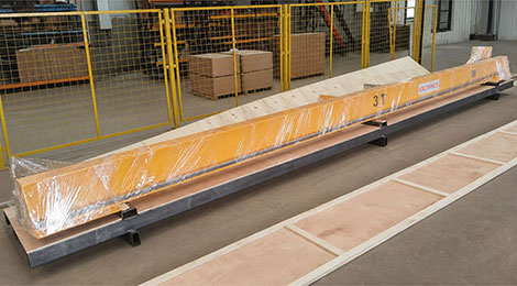 Gantry beam laid into a long plywood export case