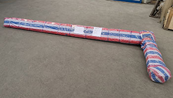 Jib crane column and arm wrapped full length in waterproof tarpaulin