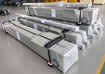 End carriages film-wrapped on channel-steel skids