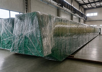 Main girder wrapped in film and tarpaulin