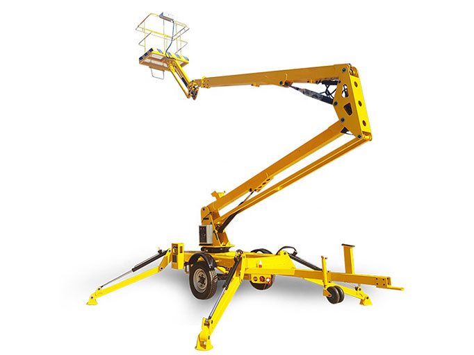 Towable boom lifts