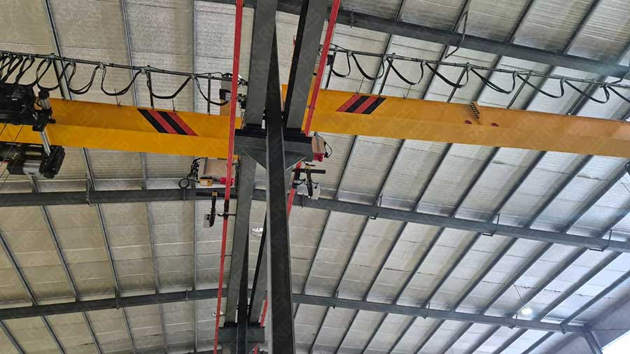 Crane runway beam, festoon cable system and supporting steel structure