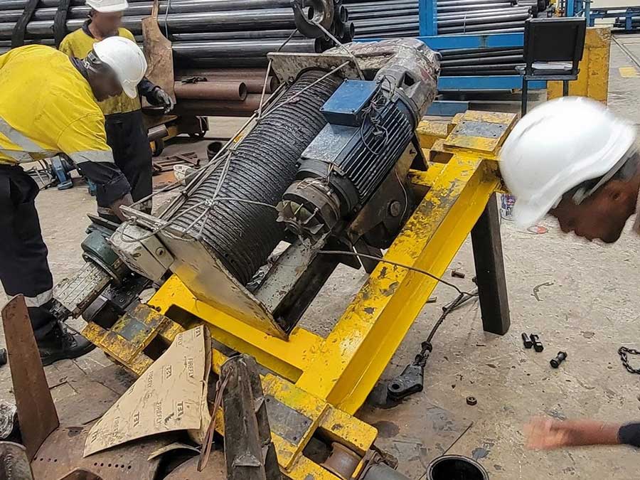 Old winch type hoist trolley removed from a double girder overhead crane during modernization at a steel plant in Kenya