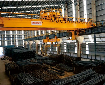Magnet lifting beam crane handling rebar bundles in a steel plant
