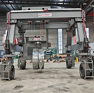 Custom C-hook RTG crane at a steel coil storage warehouse